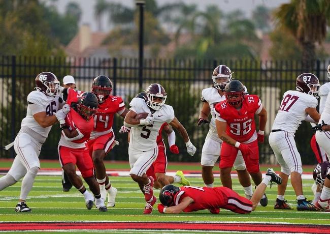 Mt. SAC's #5 Devin Miles (RB) breaks free through the line of the Eagles.